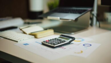 AgroGeneration збільшує площі під озимину на 50% 43 a calculator sitting on top of a table next to a laptop